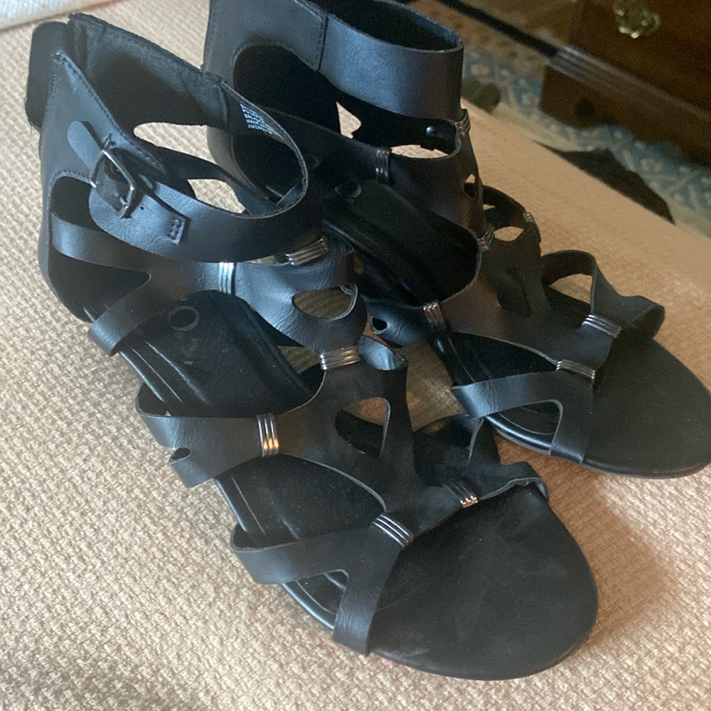 Black cutout wedges.